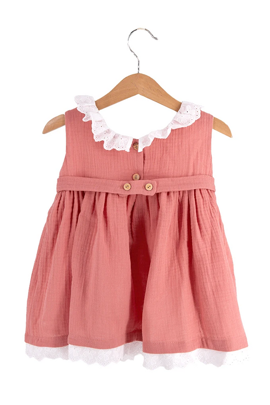 Vestido de bebé em musselina