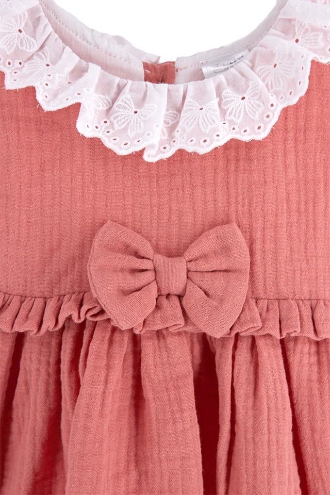 Vestido de bebé em musselina